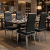 Set of Four Black And Silver Faux Leather And Stainless Steel Dining Side Chairs