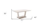 71" White Wood and Metal Self-Storing Leaf Pedestal Base Extendable Dining Table