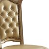 Set of Two Tufted Bone and Brass Upholstered Faux Leather And Wood Dining Side Chairs